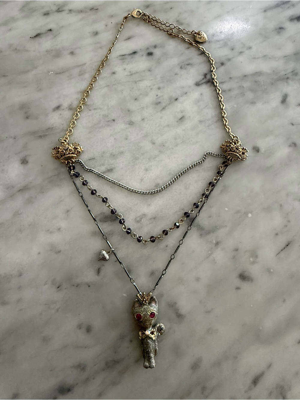 Betsey Johnson Gold and Silver Layered Cat Pendant Necklace with lavender Stones